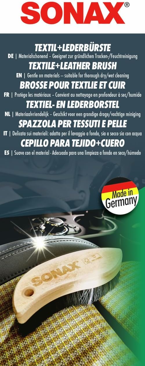 a black leather car seat cover with a yellow and red and black text